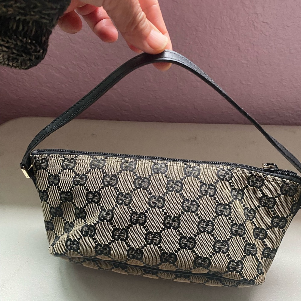 Gucci GG Boat Pouch Bag